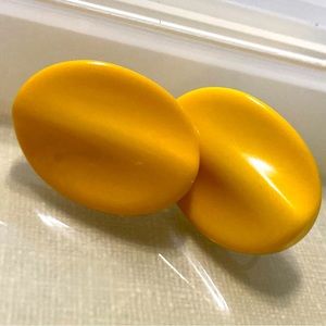 Vintage Oval Egg Yolk Yellow Bakelite clip on earrings 1.25"